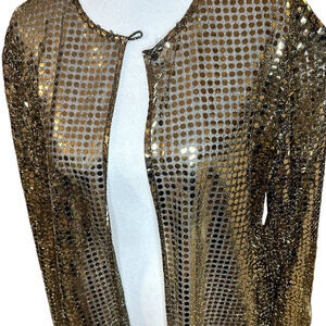 Sequence jacket.  GOLD Shell like material.  Great accent piece!